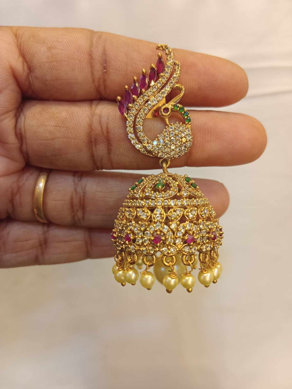ad-stone-peacock-design-earrings