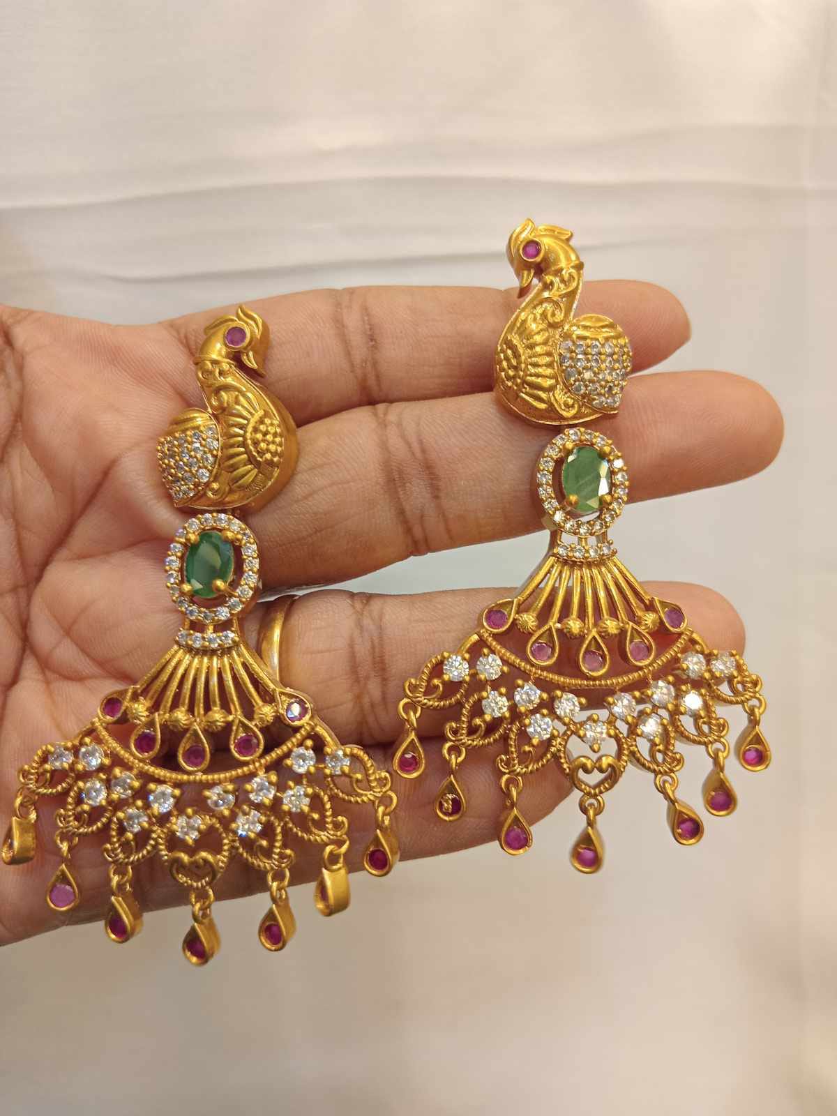 matt-finish-ad-stone-peacock-earrings