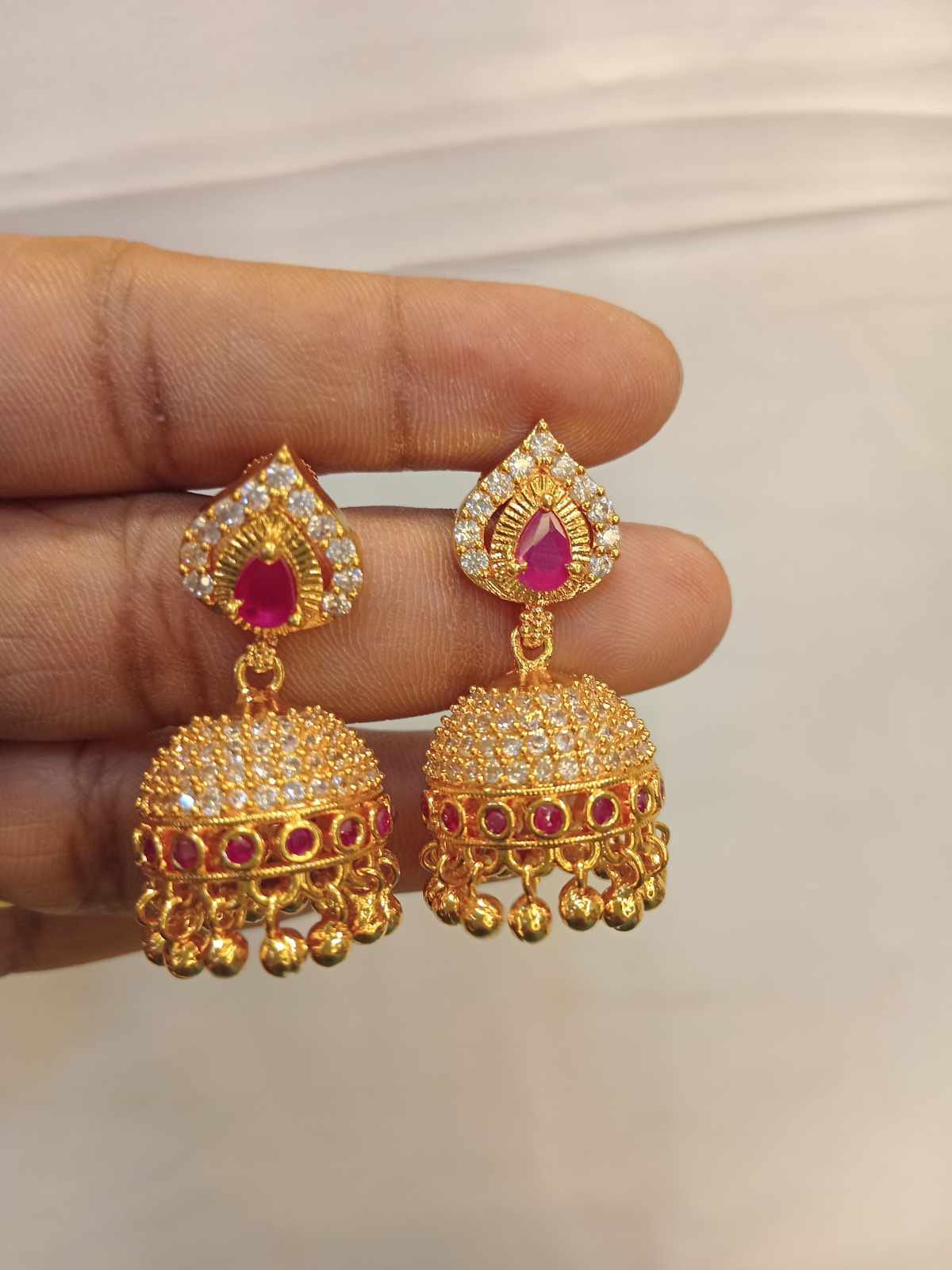 gold-finish-ad-stone-earrings