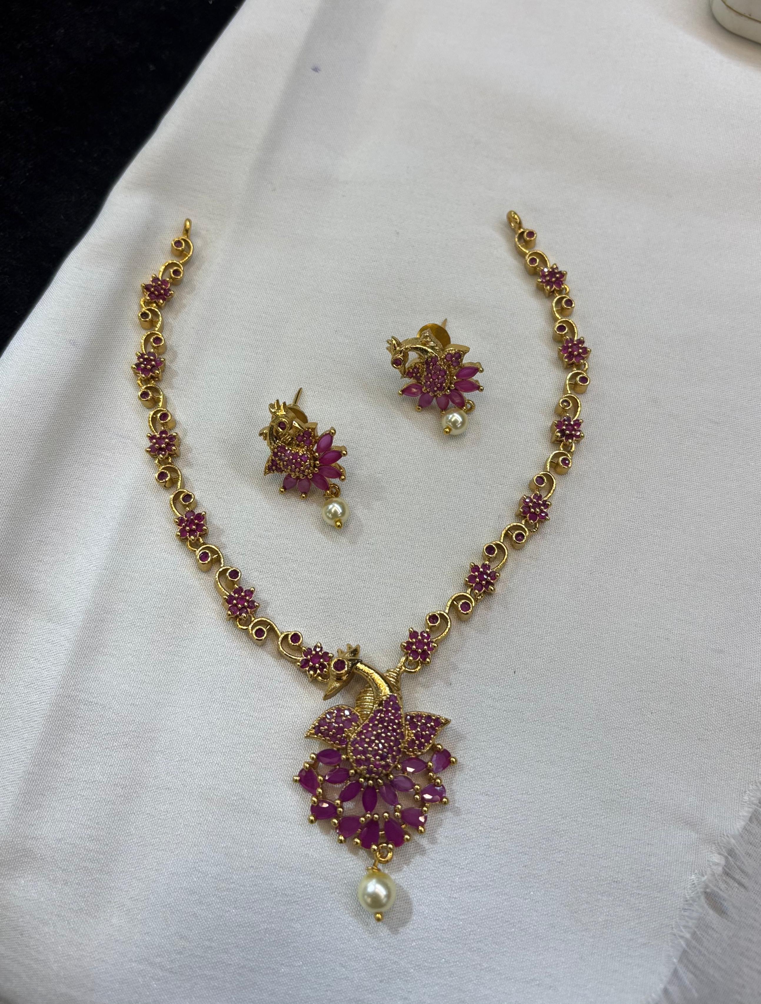 adstone-with-ruby-and-emarald-stone-necklace-set