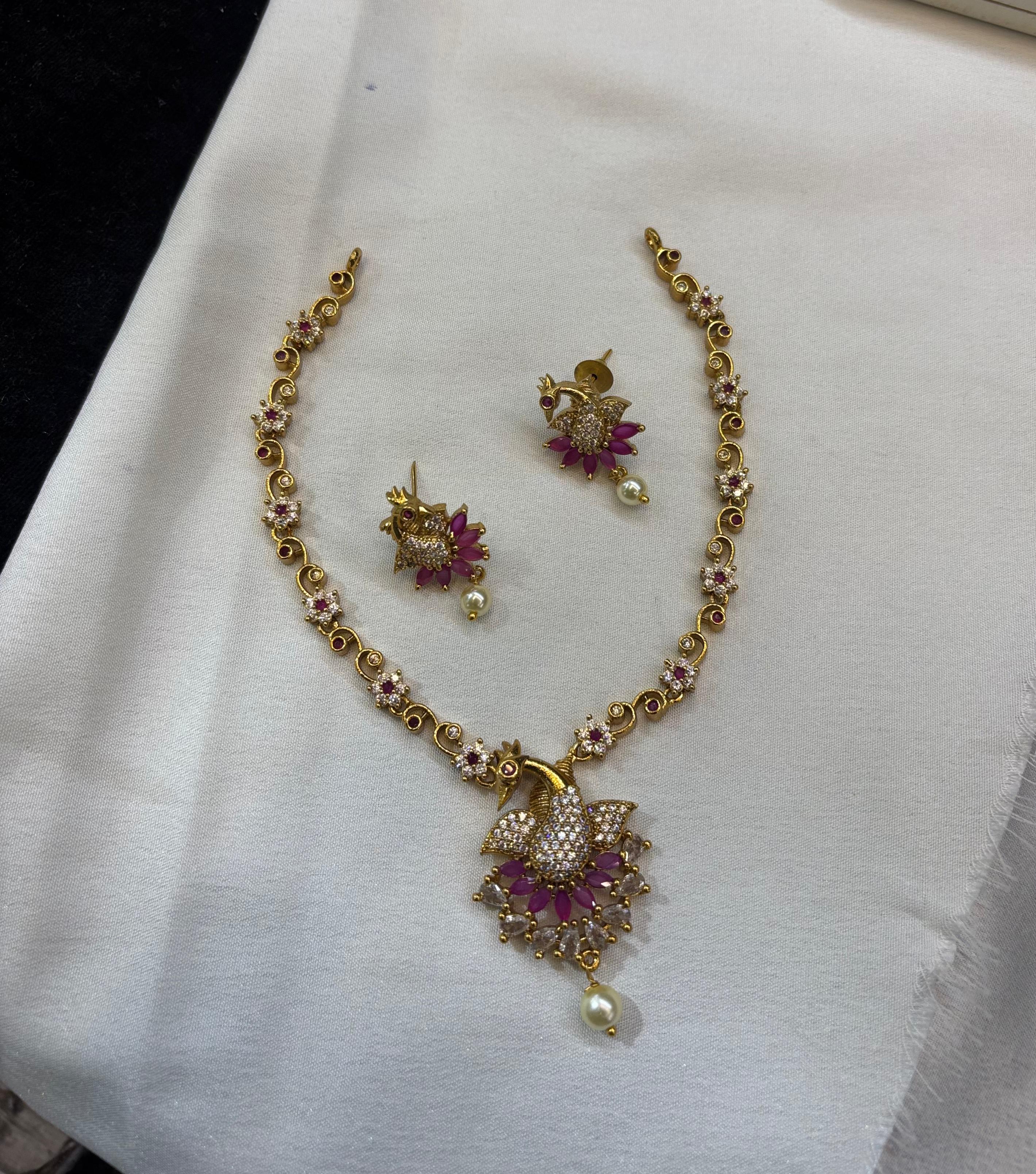 adstone-with-ruby-and-emarald-stone-necklace-set
