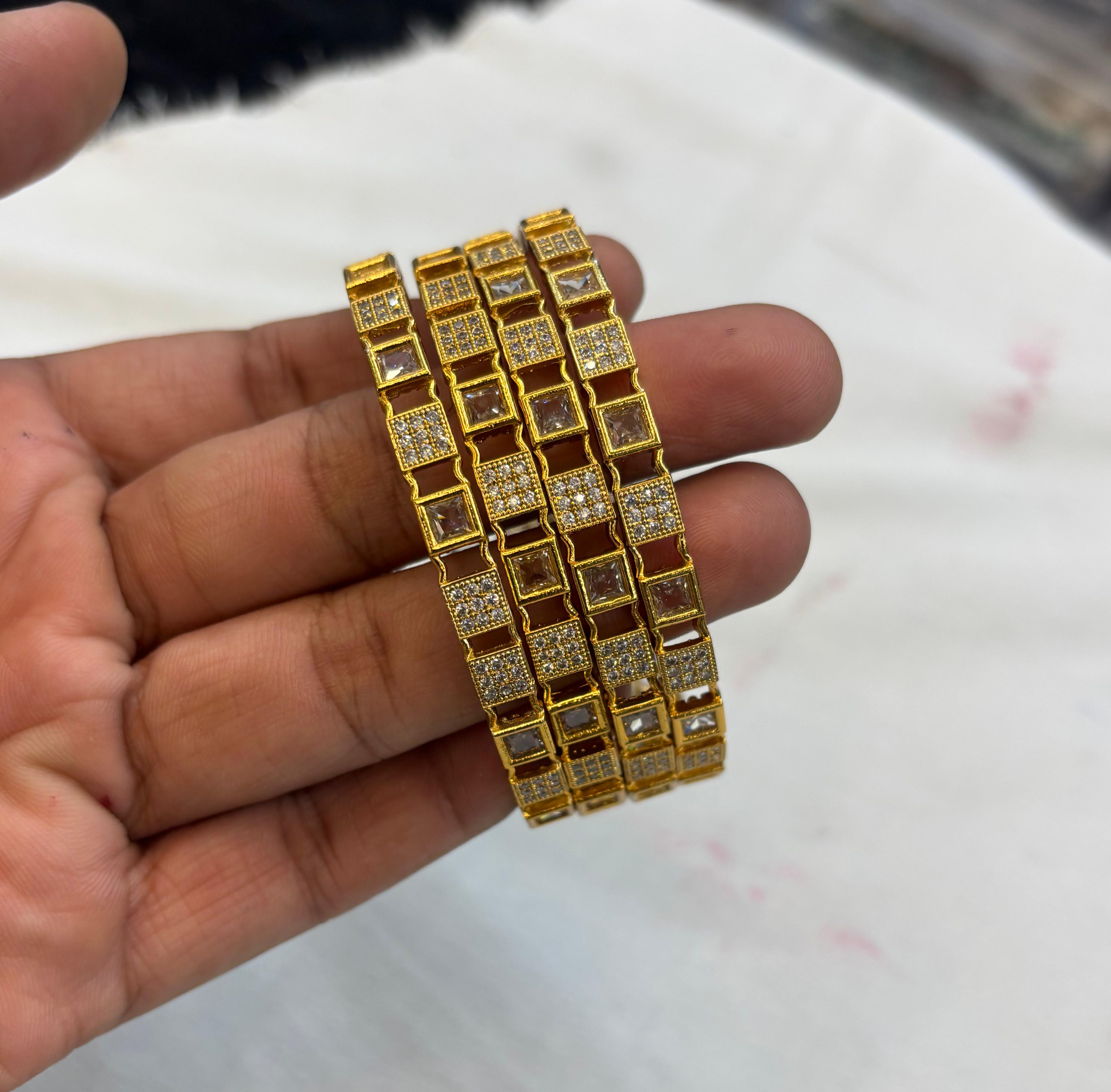 gold-finish-ad-stone-bangles