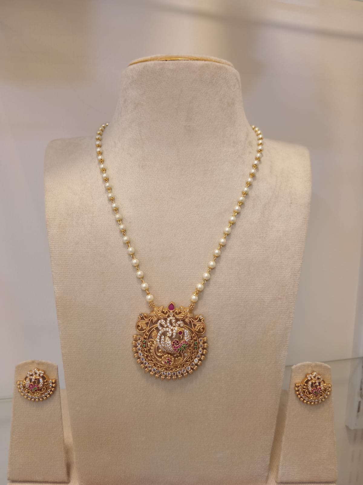ad-stone-peacock-pendant-pearl-long-chain