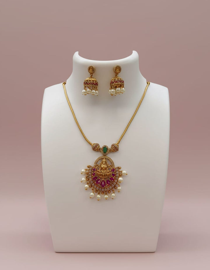 Gold Finish AD Stone Lakshmi Dollar Necklace Set