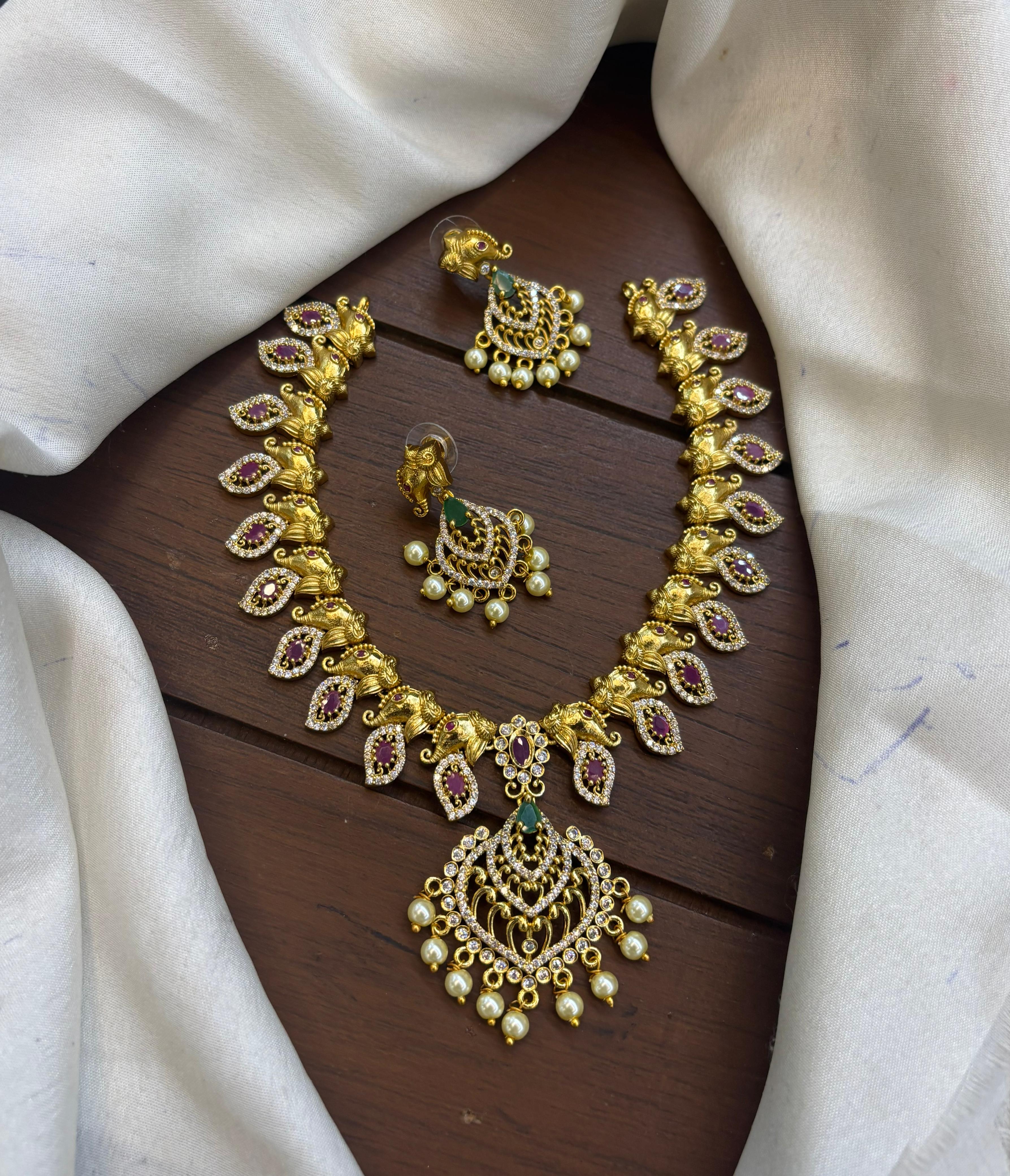gold-finish-ad-stone-necklace-set