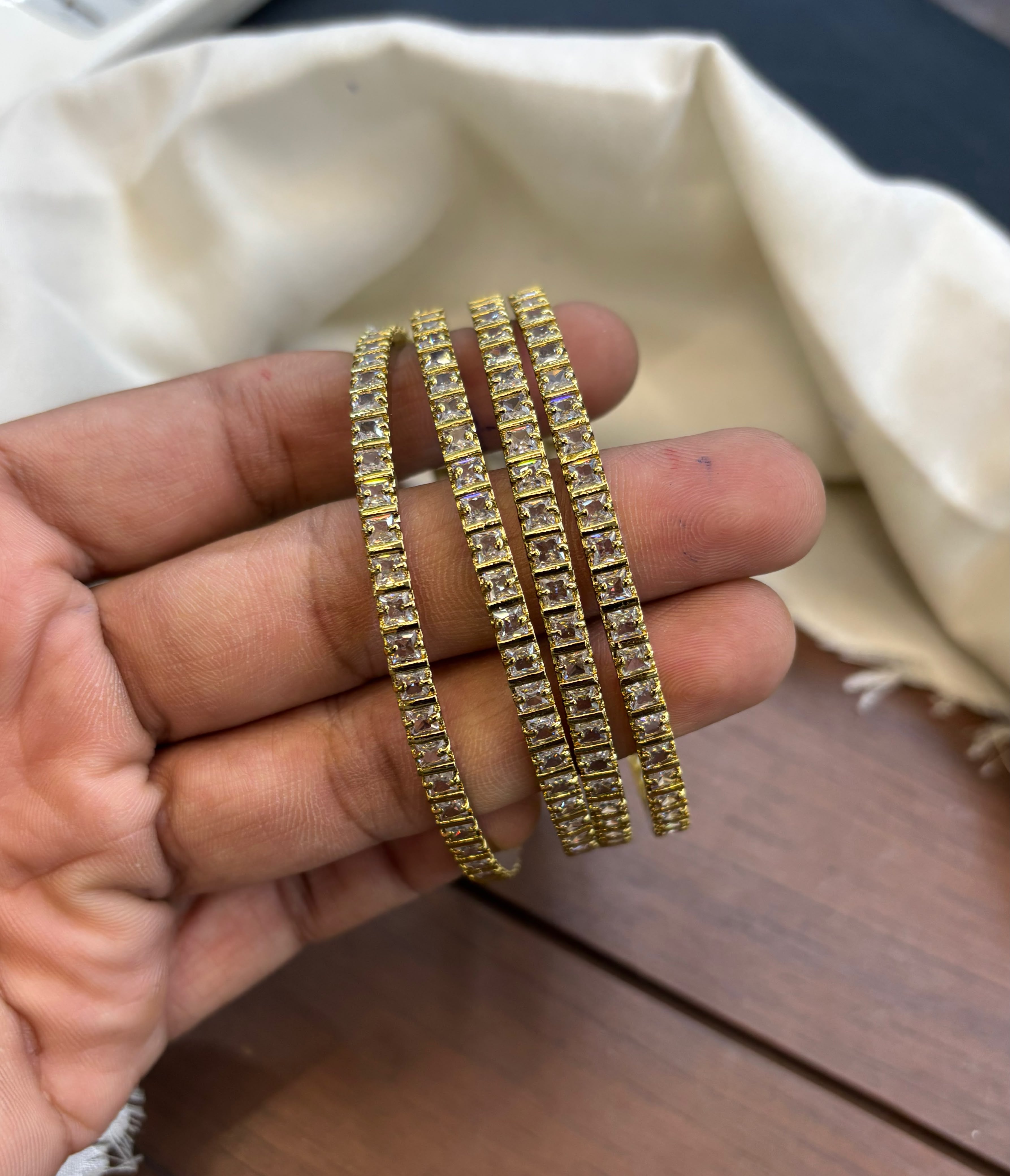 gold-finish-ad-stone-bangles
