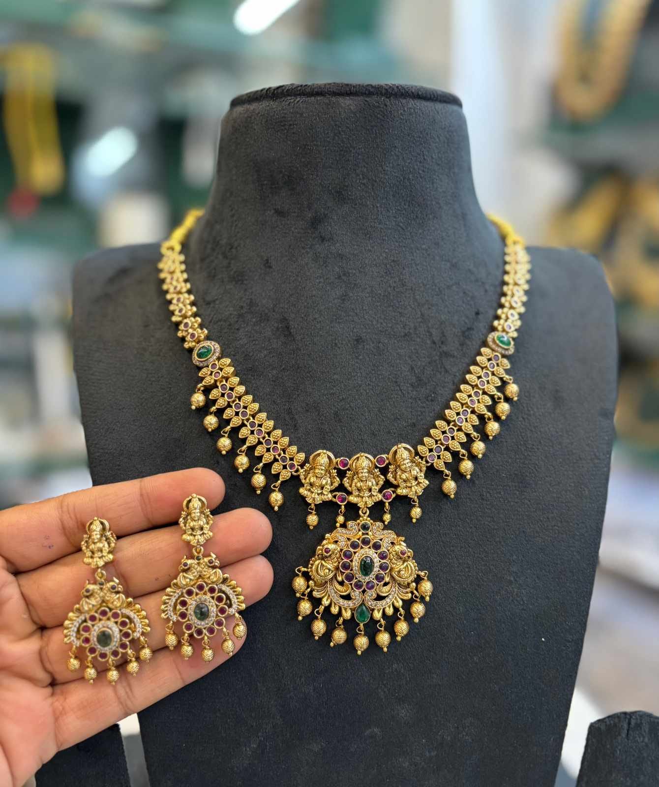 gold-finish-ad-stone-hamsa-lakshmi-necklace-set
