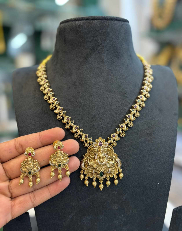 Gold Finish Antique Gajalakshmi AD Stone Necklace Set