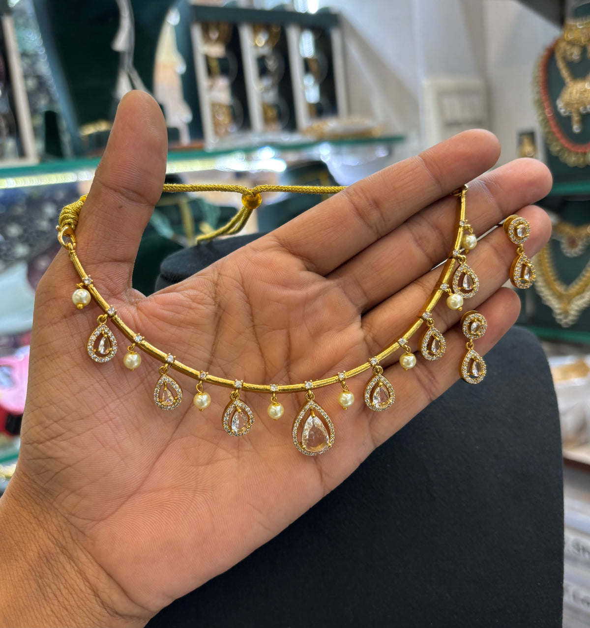 gold-finish-ad-stone-necklace-with-pearl-beads