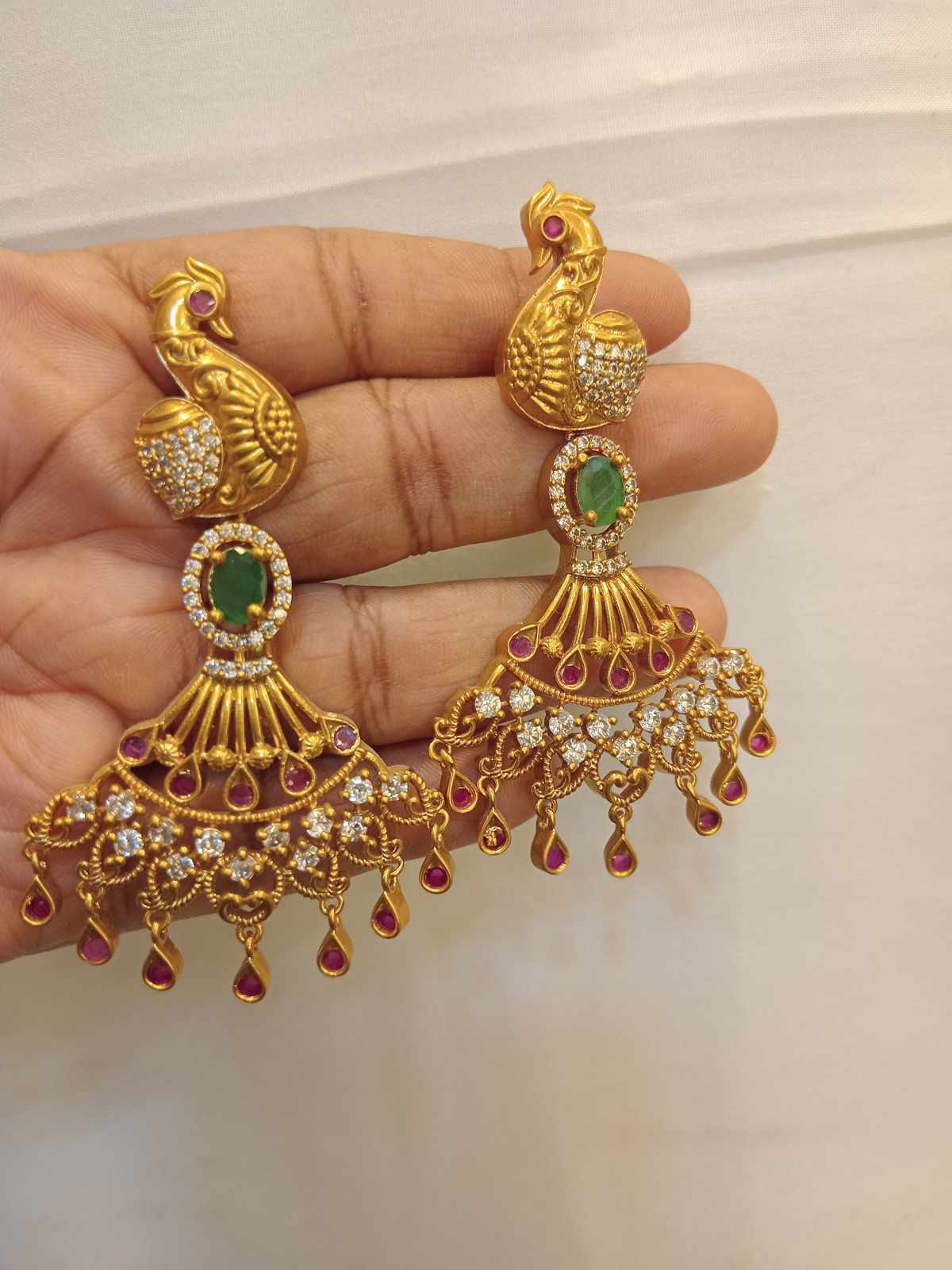 matt-finish-ad-stone-peacock-earrings