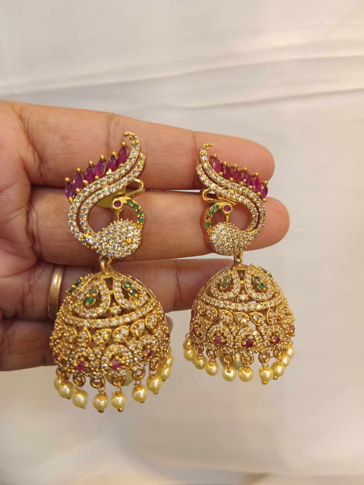 ad-stone-peacock-design-earrings