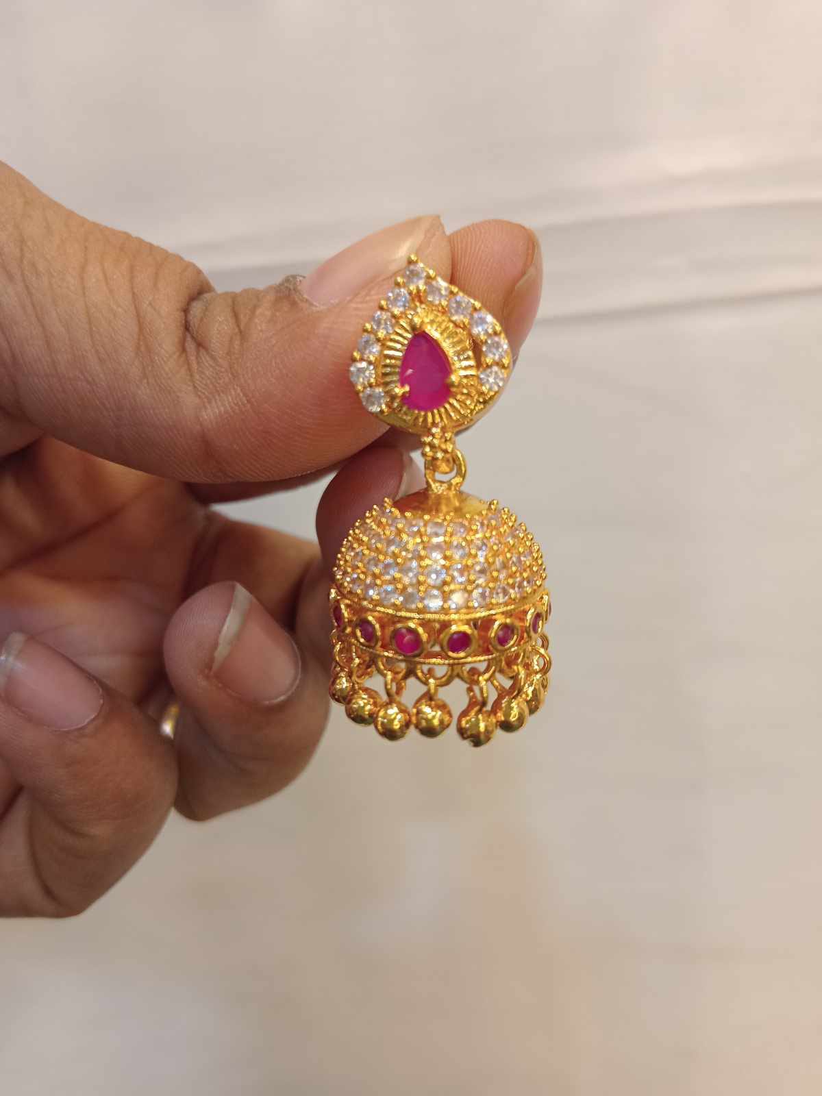 gold-finish-ad-stone-earrings