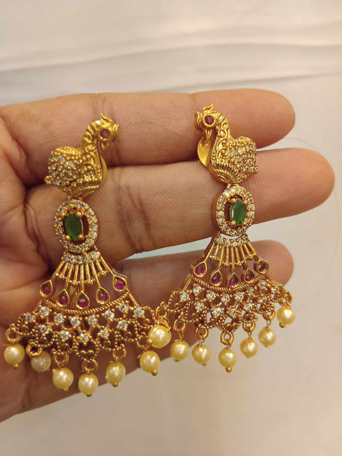 matt-finish-peacock-earrings