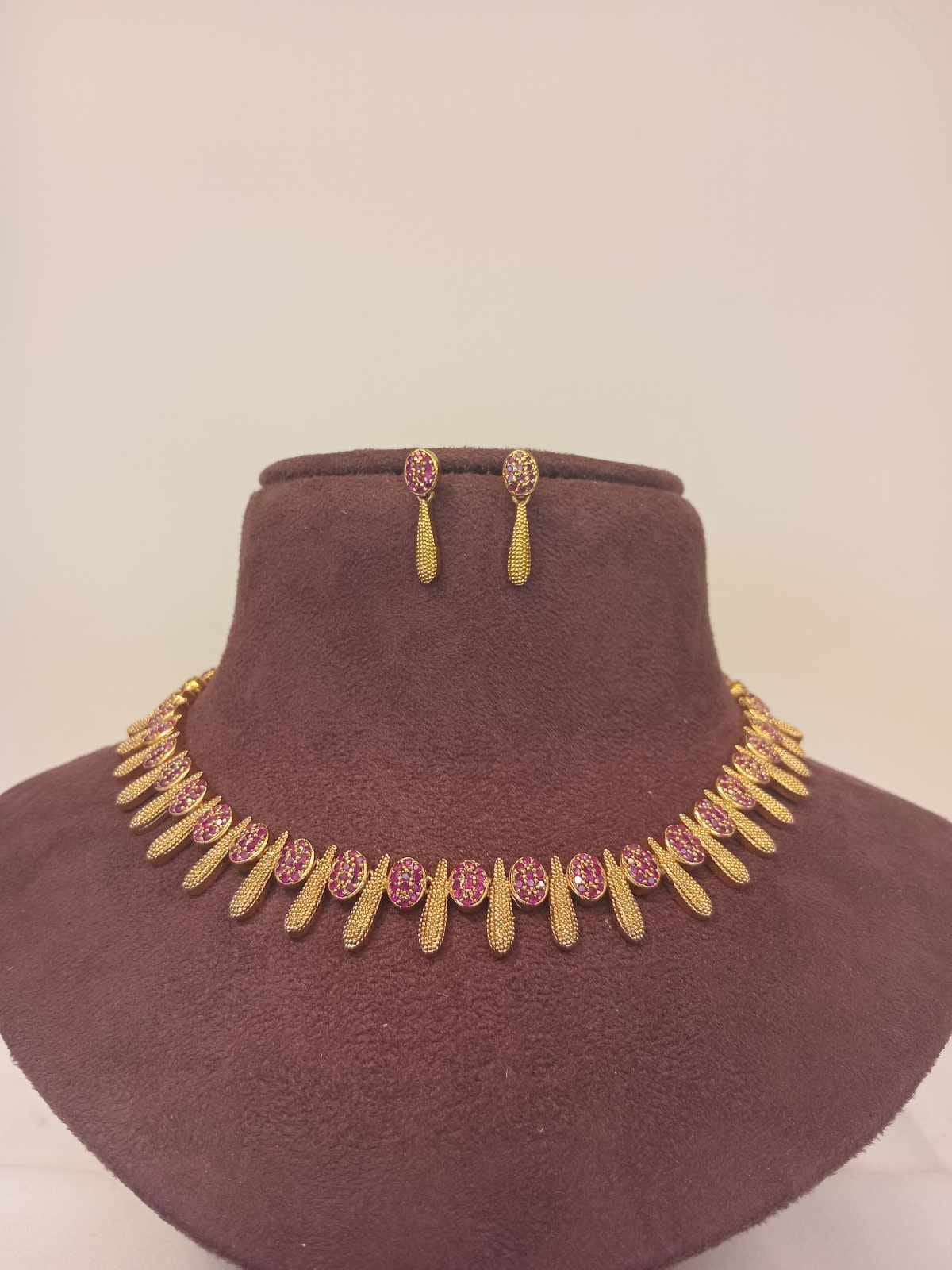 gold-finish-ad-stone-forming-jewelry