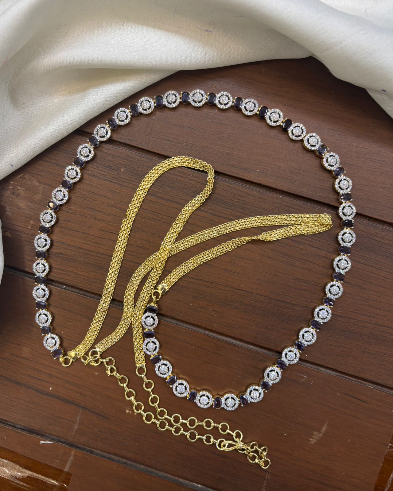 gj-polish-ad-stone-hip-chain