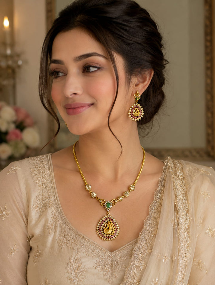 Gold finish necklace set with adstone