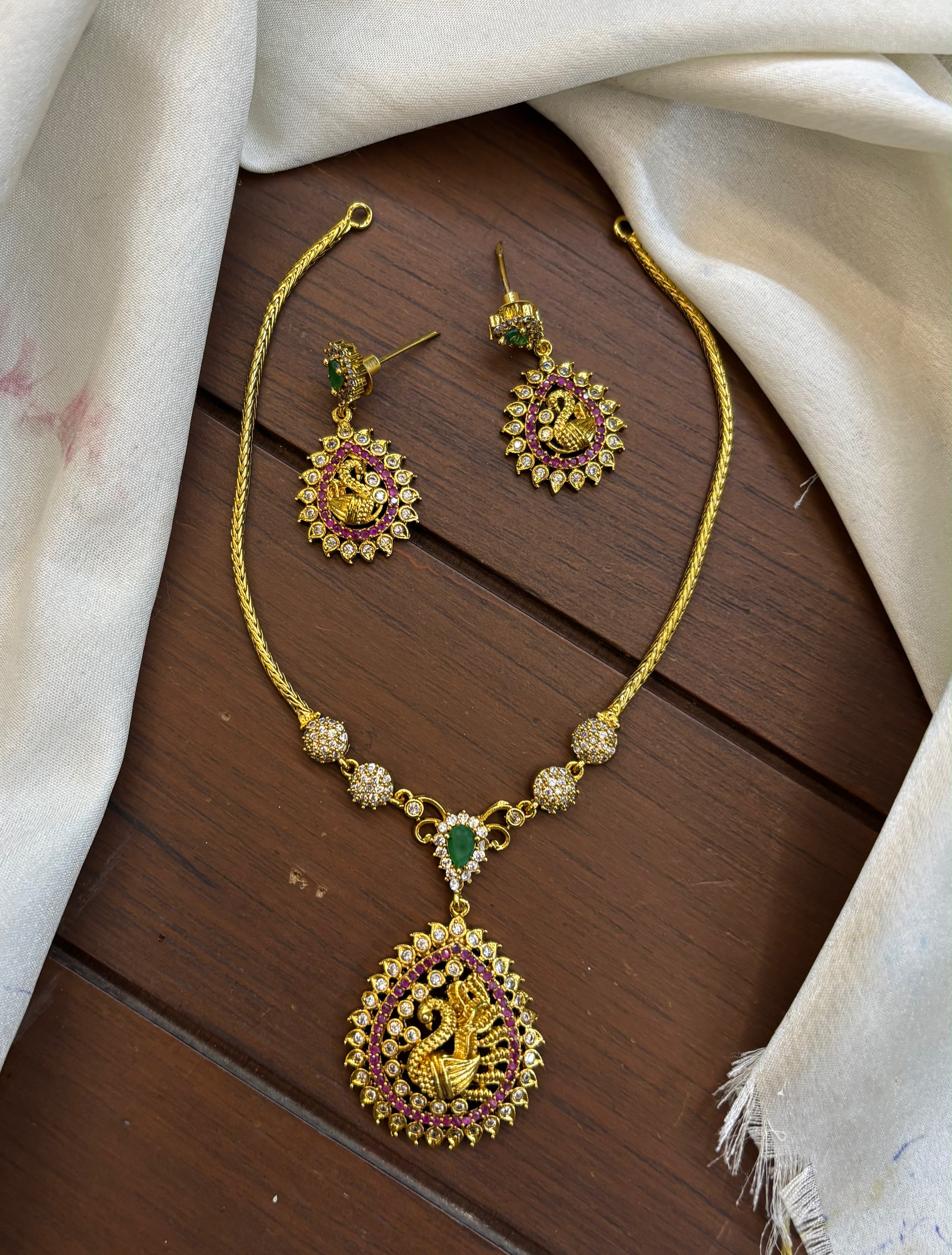 gold-finish-necklace-set-with-adstone